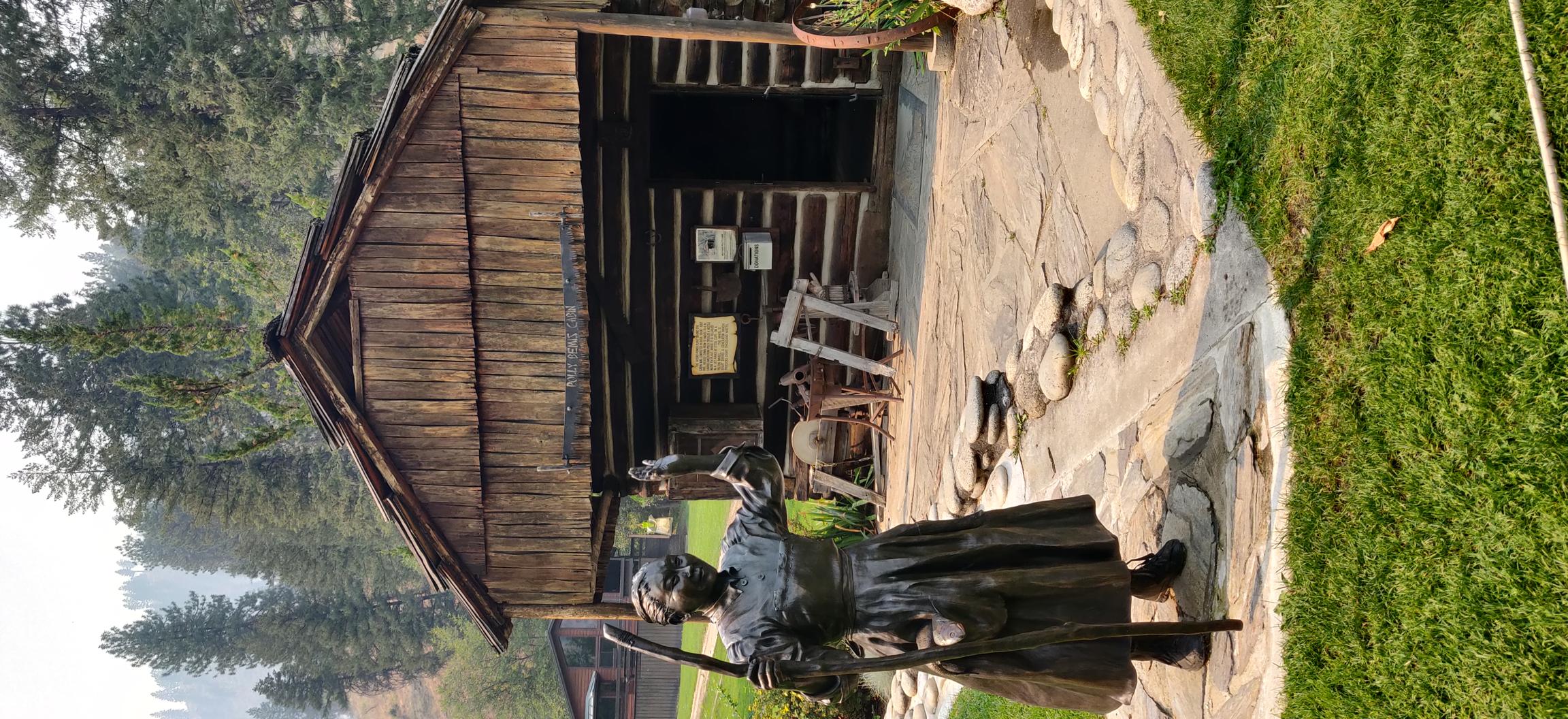 Bronze statue of a settler Polly Bemis in front of her historic homestead. She was originally an indentured servant whose freedom was allegedly won during a poker game by her future husband Charlie Bemis.